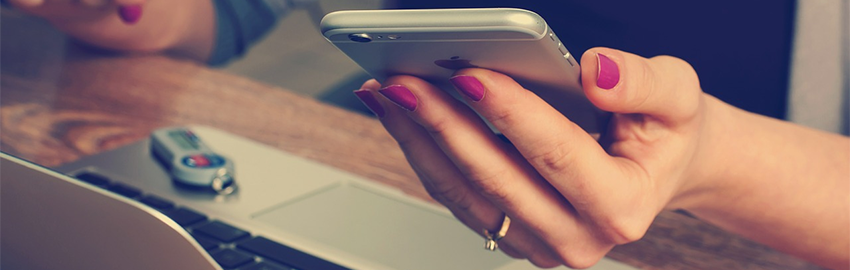 Woman with iPhone in hand