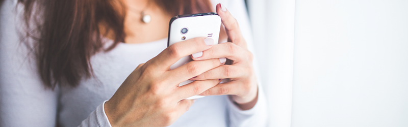 Woman mobile browsing on phone