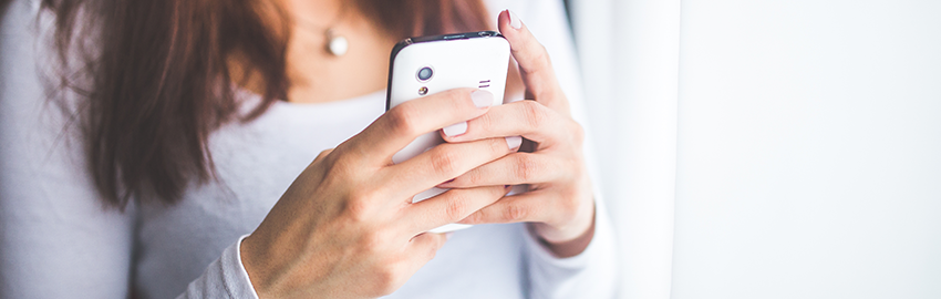 Woman mobile browsing on phone